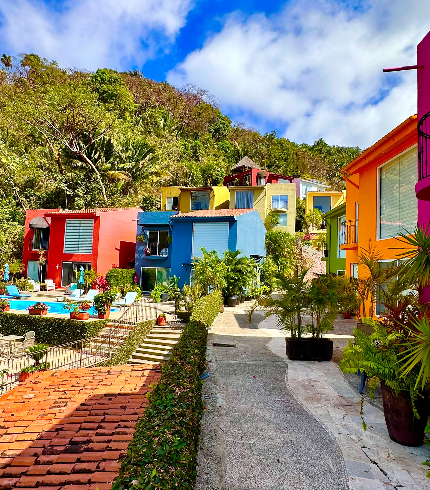 Contemporary bedroom interior with a sleek black leather armchair and stylish modern design.